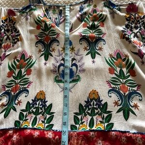 Unique peek-a-boo- shoulders, multi-colored top.